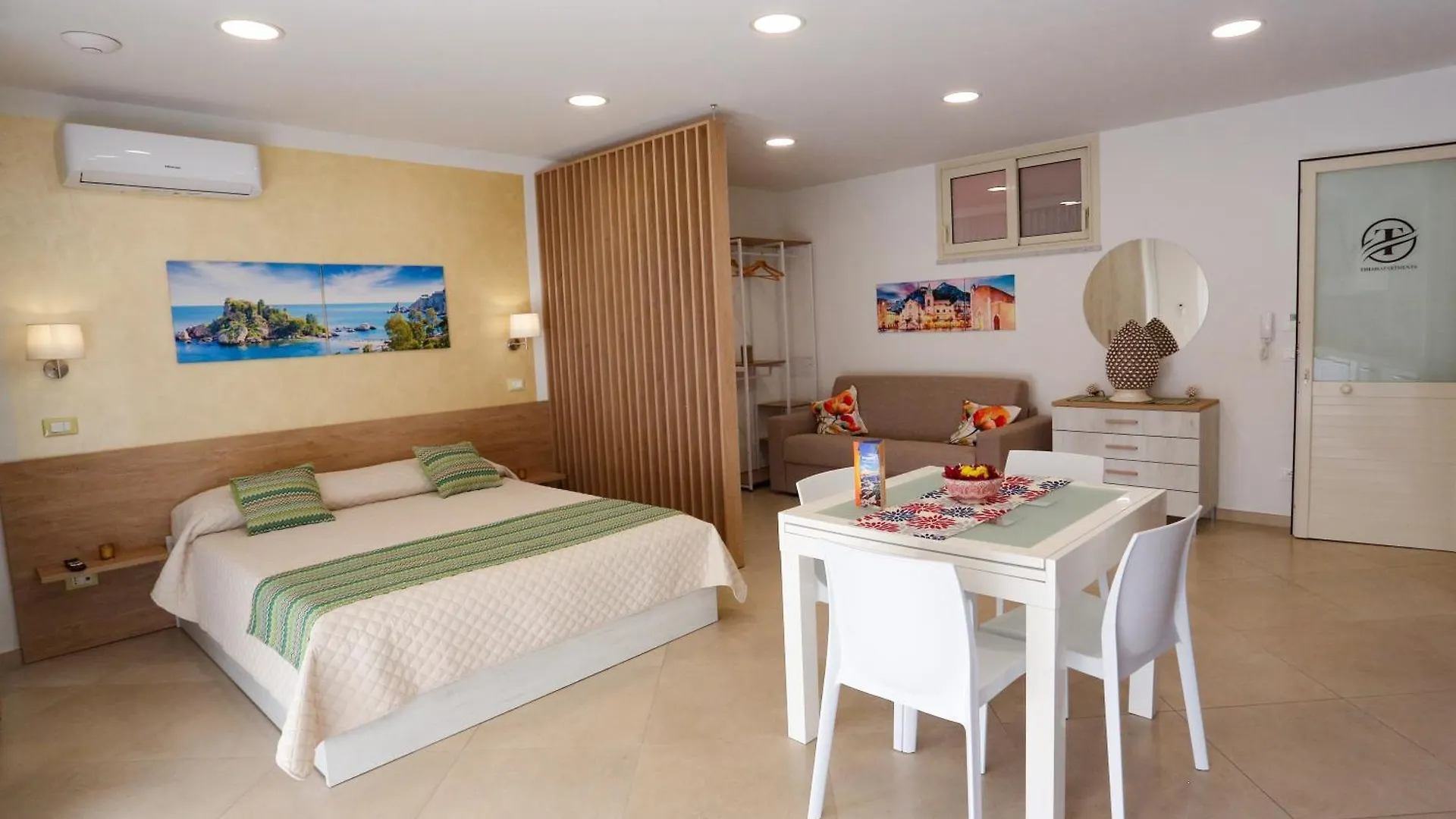 Theos Holidays Apartments location